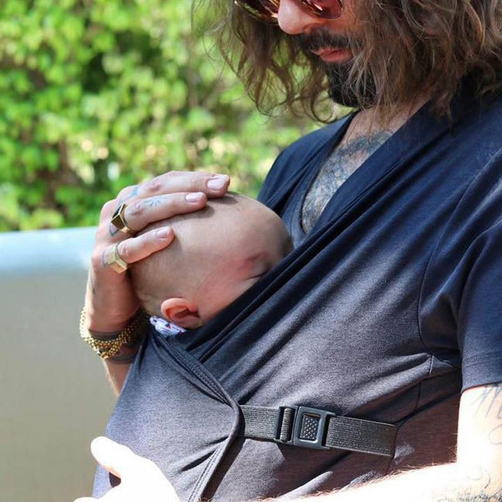 T-Shirt Vest Holding Baby Clothes